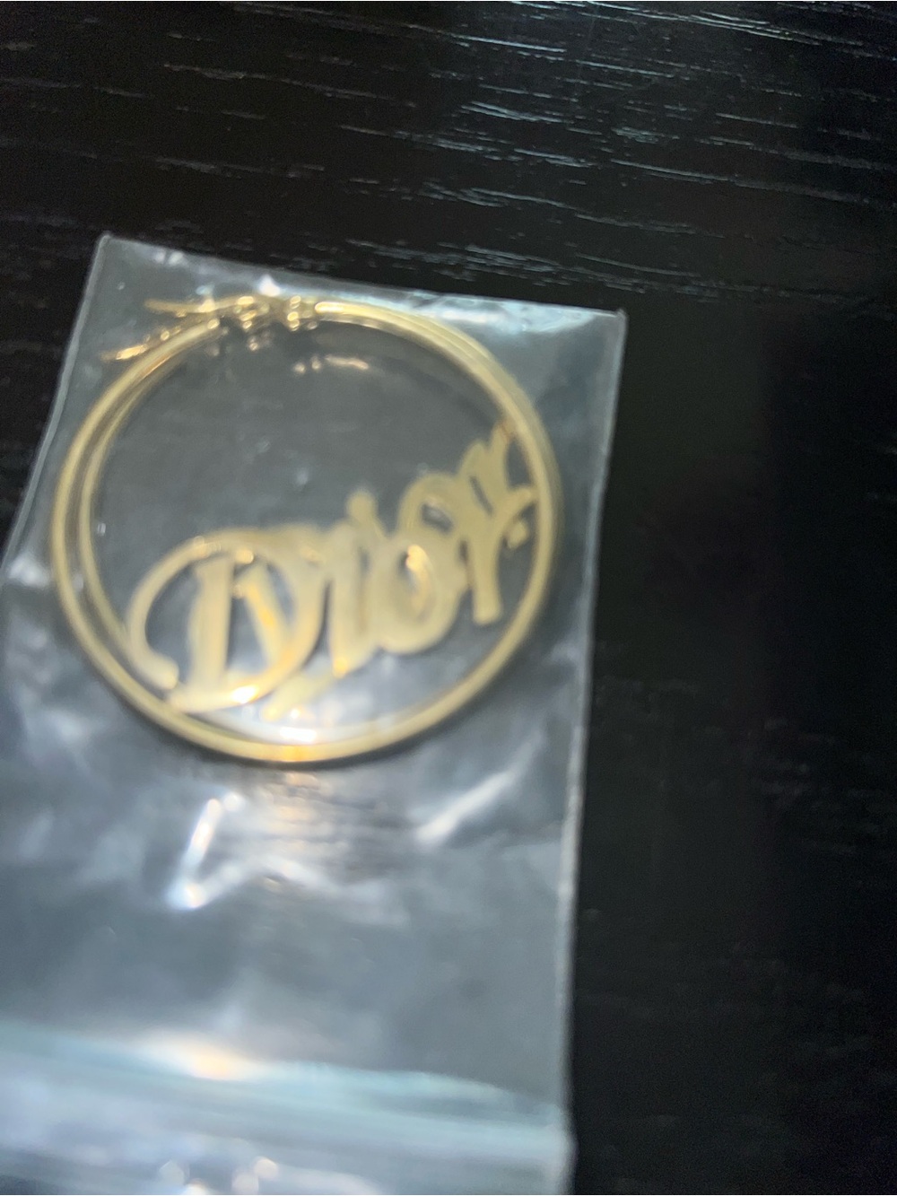 Gold-Tone Logo Hoop Earring